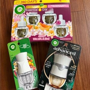 Lot of NWT Air Wick Essential Oils Plug-Ins and Refills Smell fresh like summer
